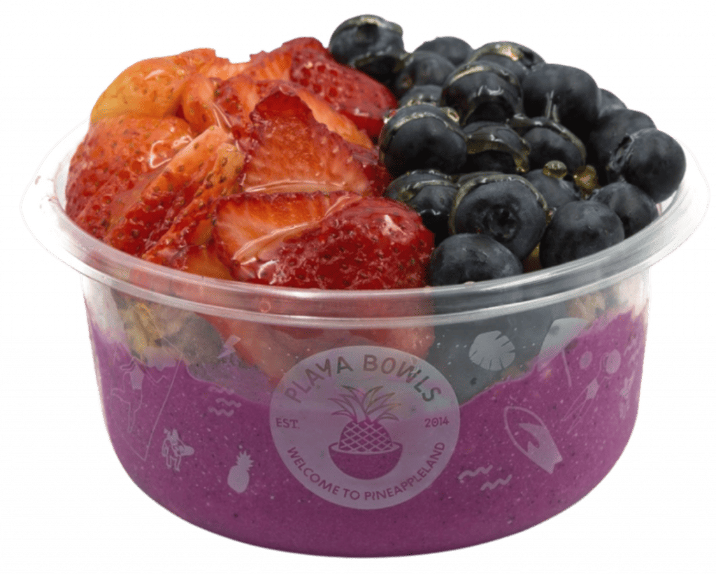 Pitaya blend topped with granola, strawberry, blueberry, honey